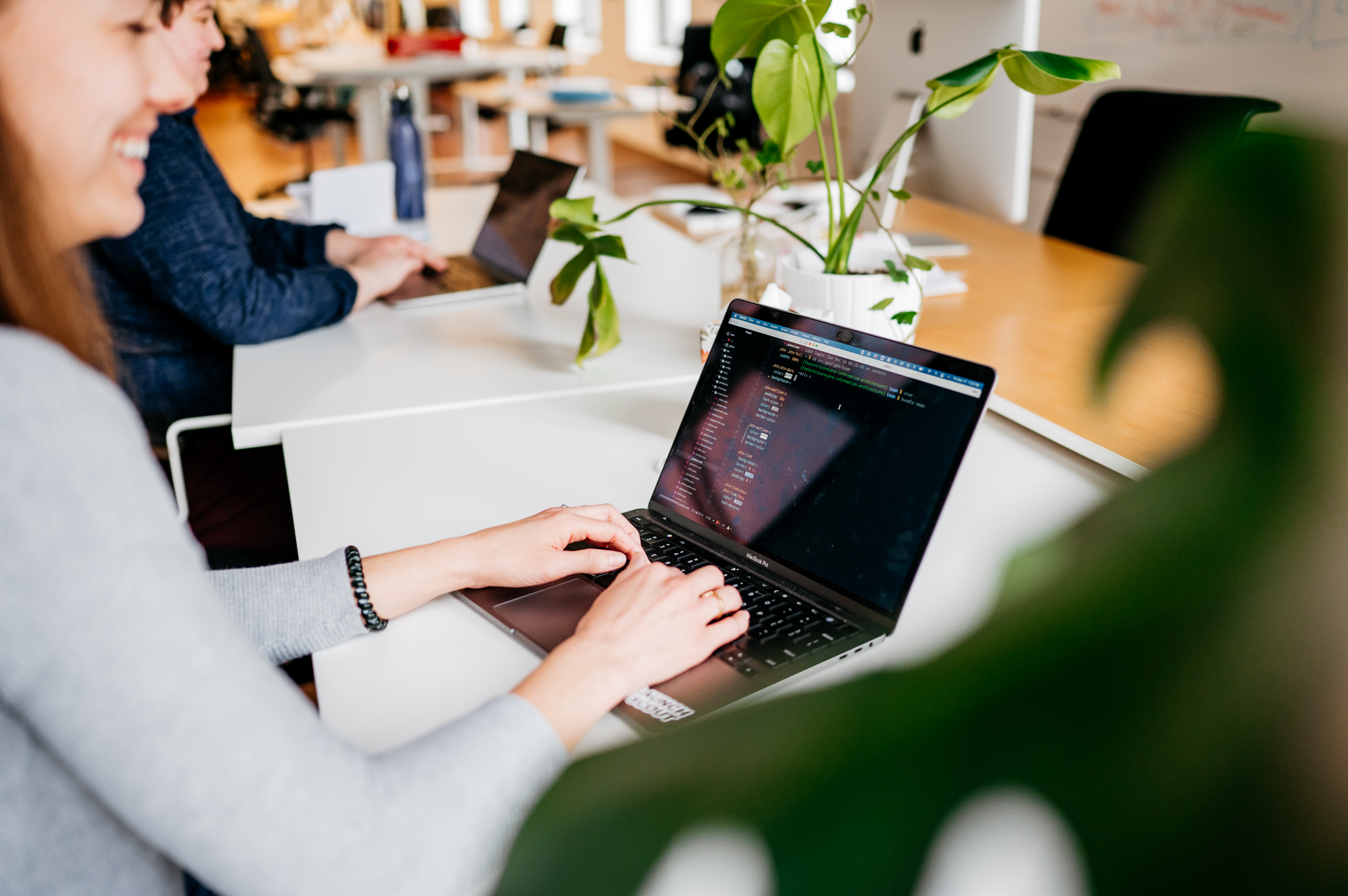 Developer working on her computer